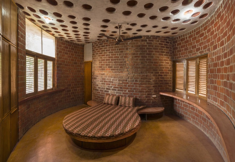 Master bedroom showing filler slab, built-in furniture, louvered windows