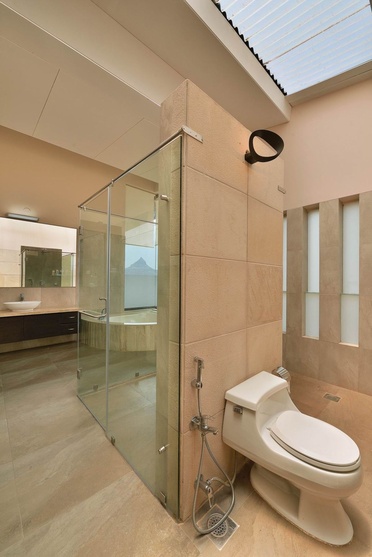 Large Modern Master Bathroom with a Toliet