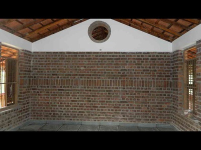 Exposed Brickwall with "soldier" row (brick laid in upright position)