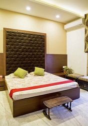 Modern Bedroom with Velvet Headboard 