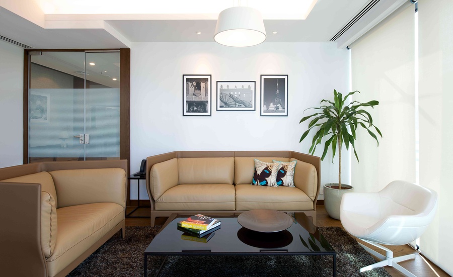 The modern italian furniture creates a sharp contrast against the black and white photoart.
