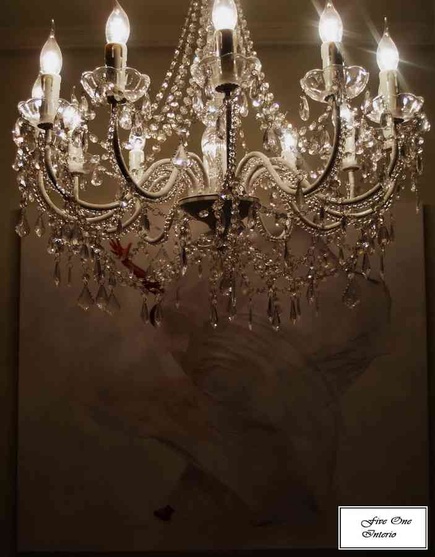 Beautiful crystal hanging light above the dinning table