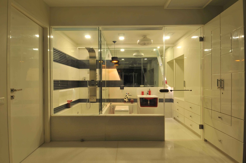 The Master Bathroom flanked with Glass