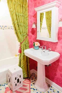 Pink wallpaper on one of the walls