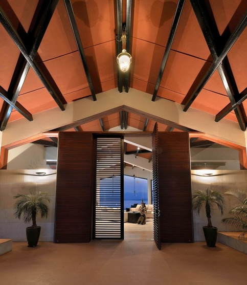 Living Room Entrance with Hut Shaped Ceiling 