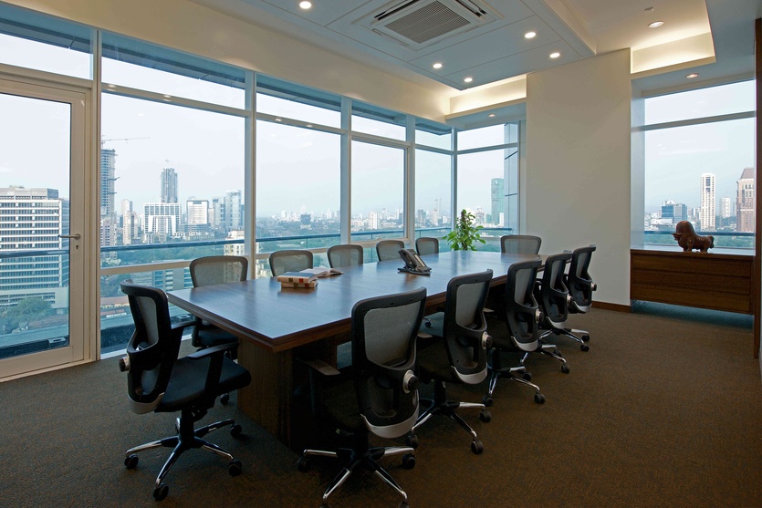 The conference rooms exhibit a sweeping view of the city's skyline.