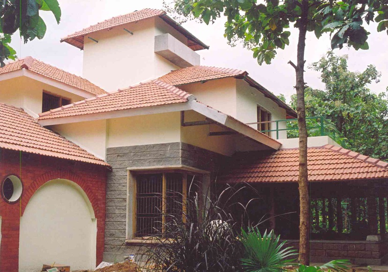 Traditional, vernacular sloping roofs with mangalore tiles