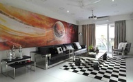 Black and White Living Room with colorful Wall Art  