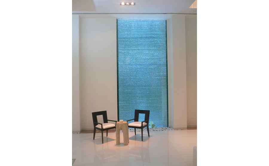 Seating Area with Thick Textured Glas Panel 
