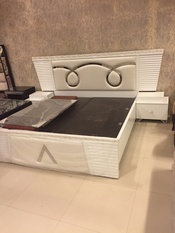 Bed with SS design element 